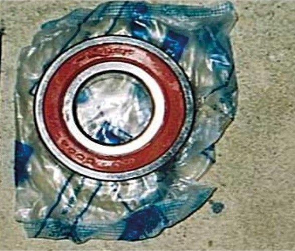 Counterfeit Bearing, Unpacked A counterfeit NSK bearing removed from its packaging