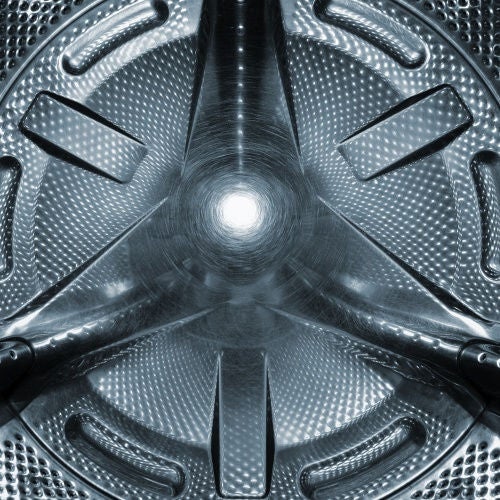 Others, white ggods, Consumer Goods, Washer Drum Closeup shot of interior of empty, chrome washing machine.
