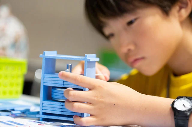 NSK Workshops for Children: Learning about Rotation and a "Mysterious Force" while Having Fun Making Things
