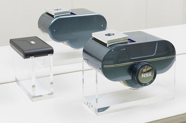 The direct drive wheel unit consists of a dedicated driver that controls the movement (left) and a pair of direct drive wheels in which the wheels and motor are stored.